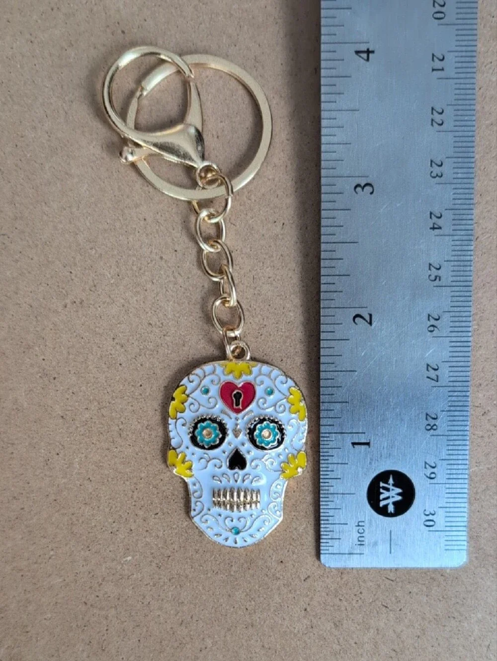 Gold-Tone White Sugar Skull Keychain by